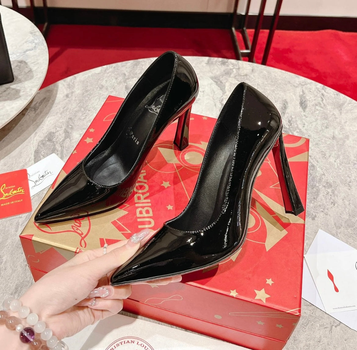 Elegant Pointed-Toe Pumps in Black with Red Sole
